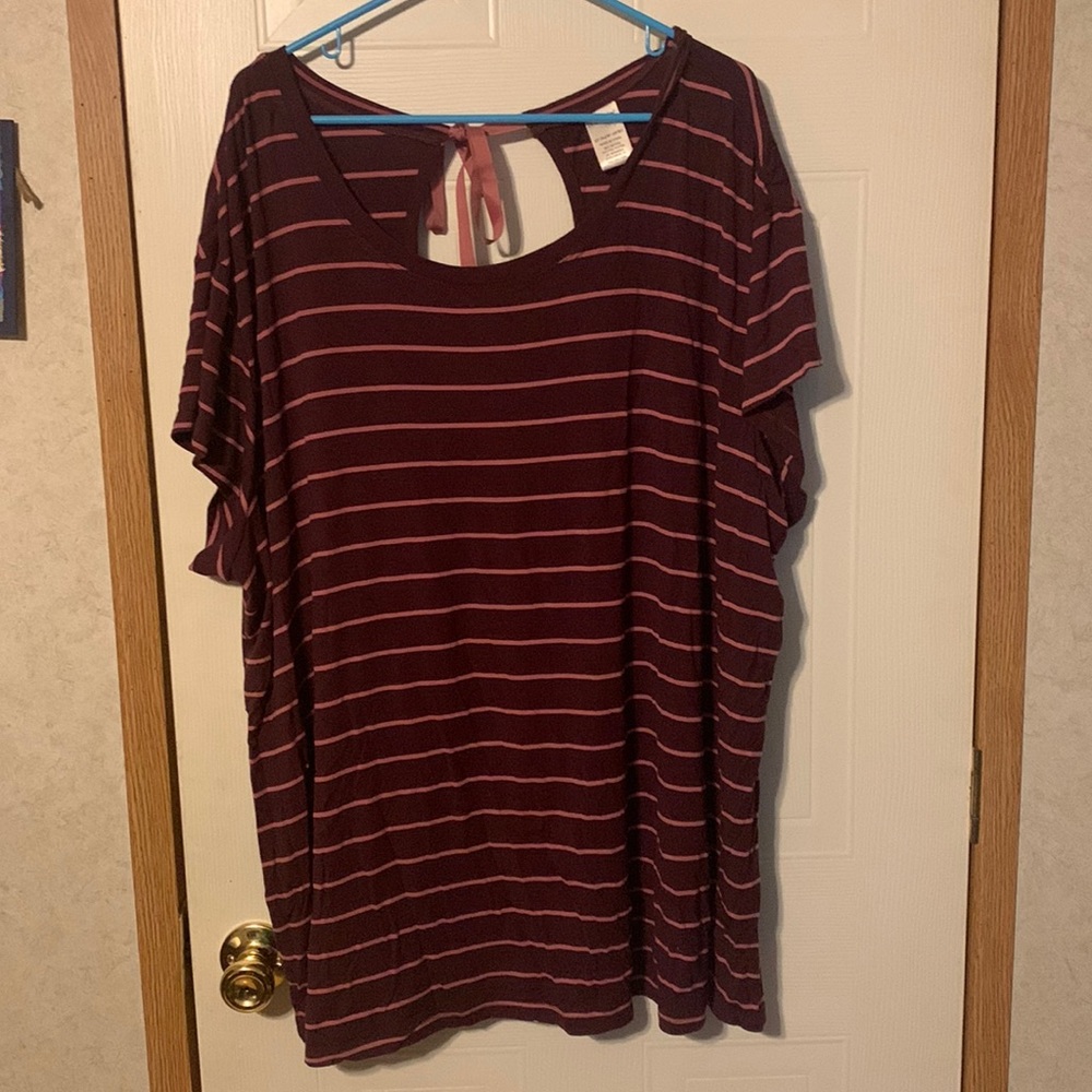 New with no tags top with a ribbon tied in the back